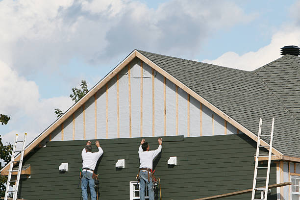Professional Vinyl Siding technician working in Lancaster, PA